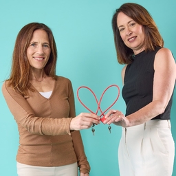 Dorothy Novick, MD, and Kimberly Sterner-Stein, MSW, MPH, display gun locks that are distributed free to families.